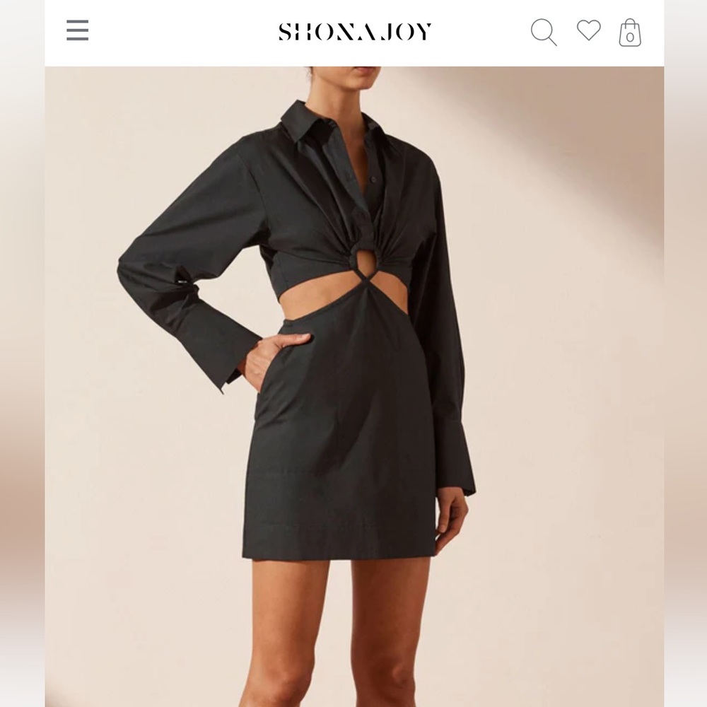 New with tags, Andrea Mini Dress in Black
Shona Joy